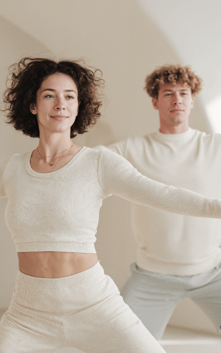 Couple Practicing Yoga Wellness Studio - Longevity Webflow Template | Brix Templates
