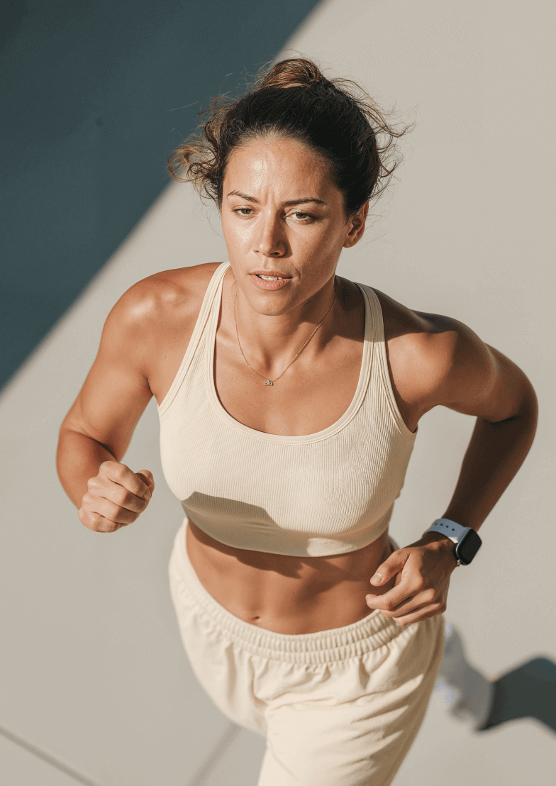 Woman Running Smartwatch FItness - Longevity Webflow Template | Brix Templates