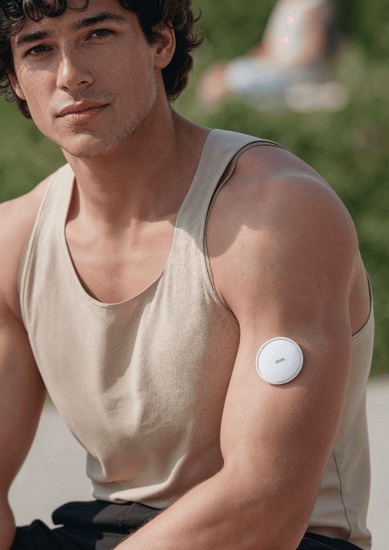 Man Wearing Continuous Glucose Monitor - Longevity Webflow Template | Brix Templates